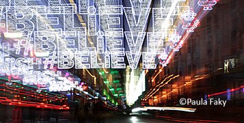 Blurred repetitive view of the Brighton christmas lights word Believe. Photo by Paula Faky.